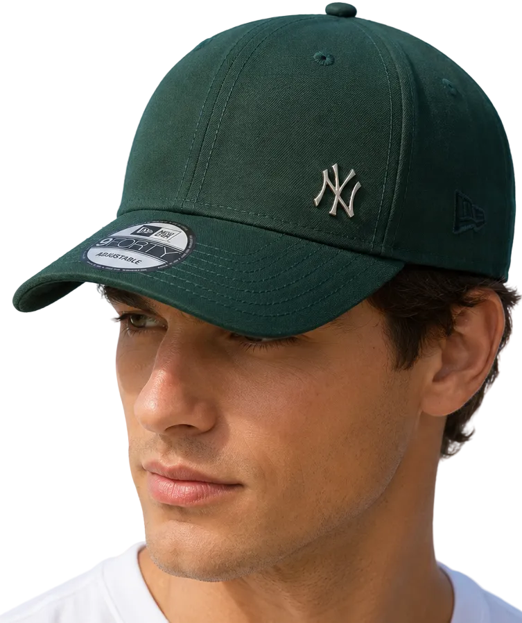 A man and a woman wearing matching dark green New York Yankees baseball caps with the New Era 9FORTY logo and embroidered NY emblem, set against a clear blue sky.