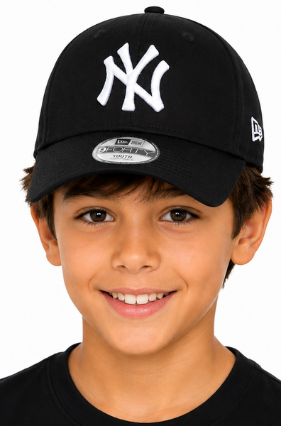 boy wearing black ny baseball cap
