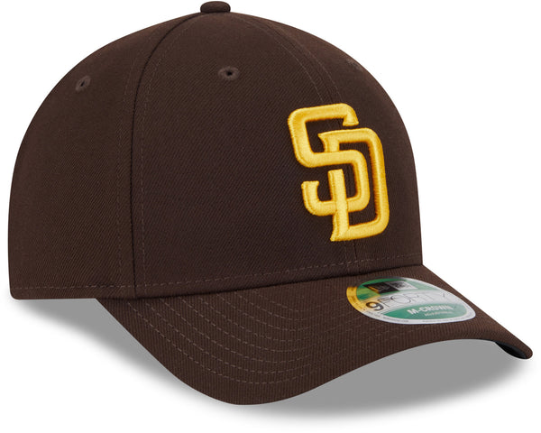 Side angled view of San Diego Padres New Era baseball cap with curved visor and structured crown, official MLB Padres fan cap